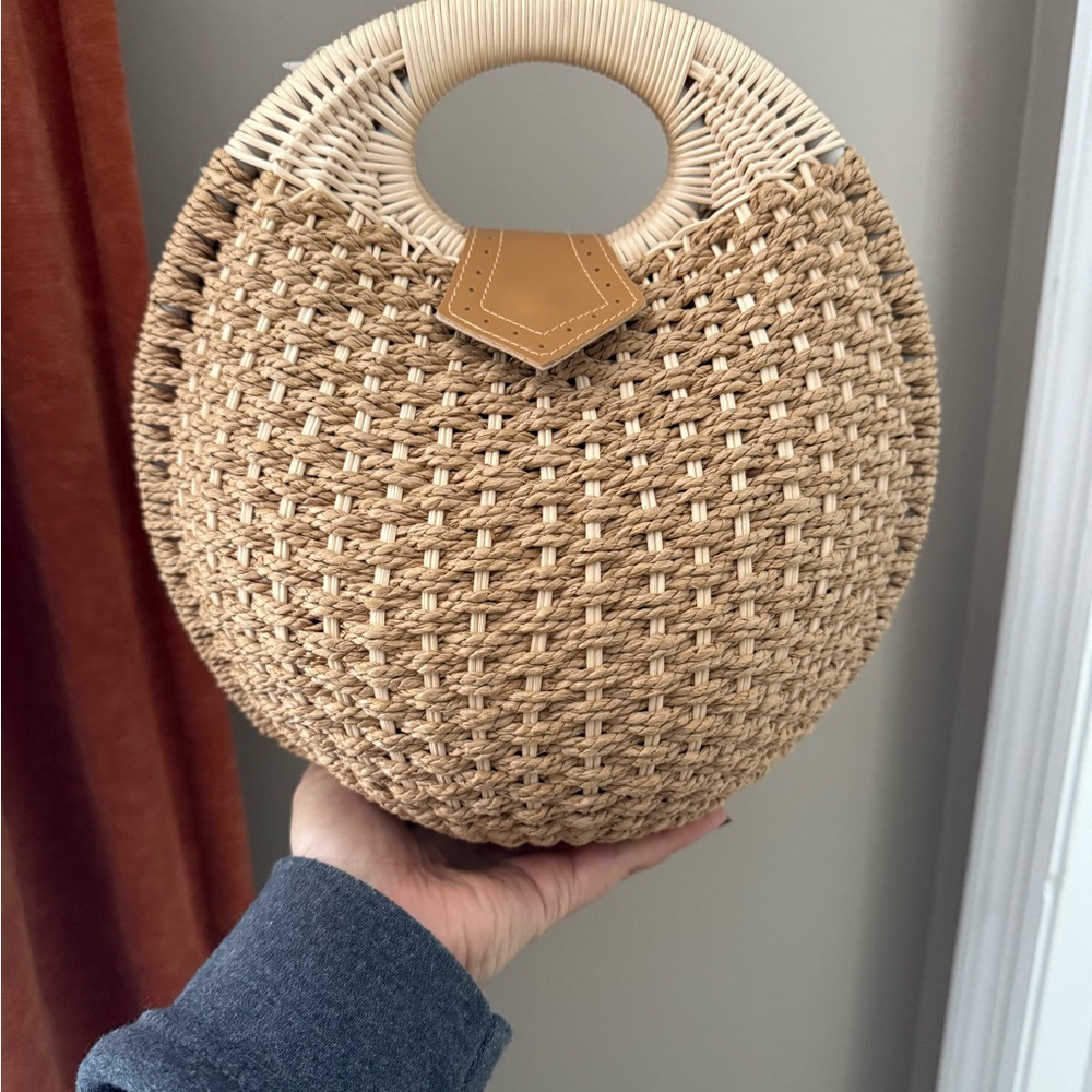Tan Circular Woven Clutch with Cutout Handle